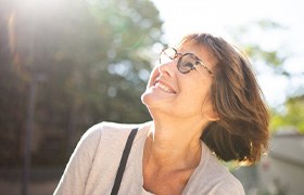 Lady smiles outdoors