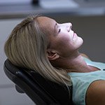 Woman relaxing in dental chair