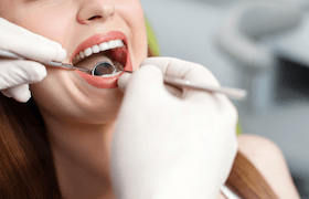 woman having dental cleaning