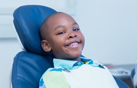 Smiling child in dental chair