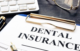 Dental insurance paperwork for the cost of dentures in Aurora