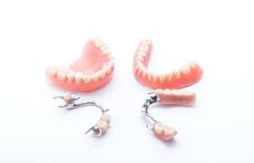 two full dentures and two partials