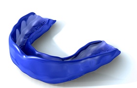 Blue mouthguard from dentist.