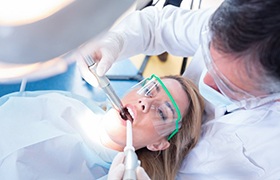 sedation dentist in Aurora treating woman 