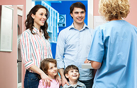 Smiling family at dental office