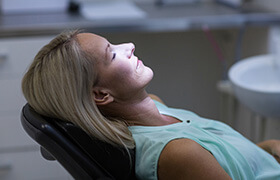 Relaxed woman in dental chair