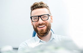 man happy at dentist