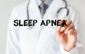Doctor writing “Sleep apnea”