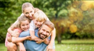 Happy family after seeing a family dentist