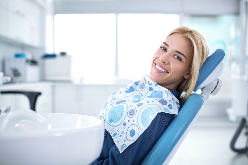A woman visiting a dentist for cosmetic dentistry.