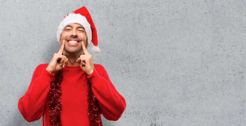 A man with good oral health during the holidays